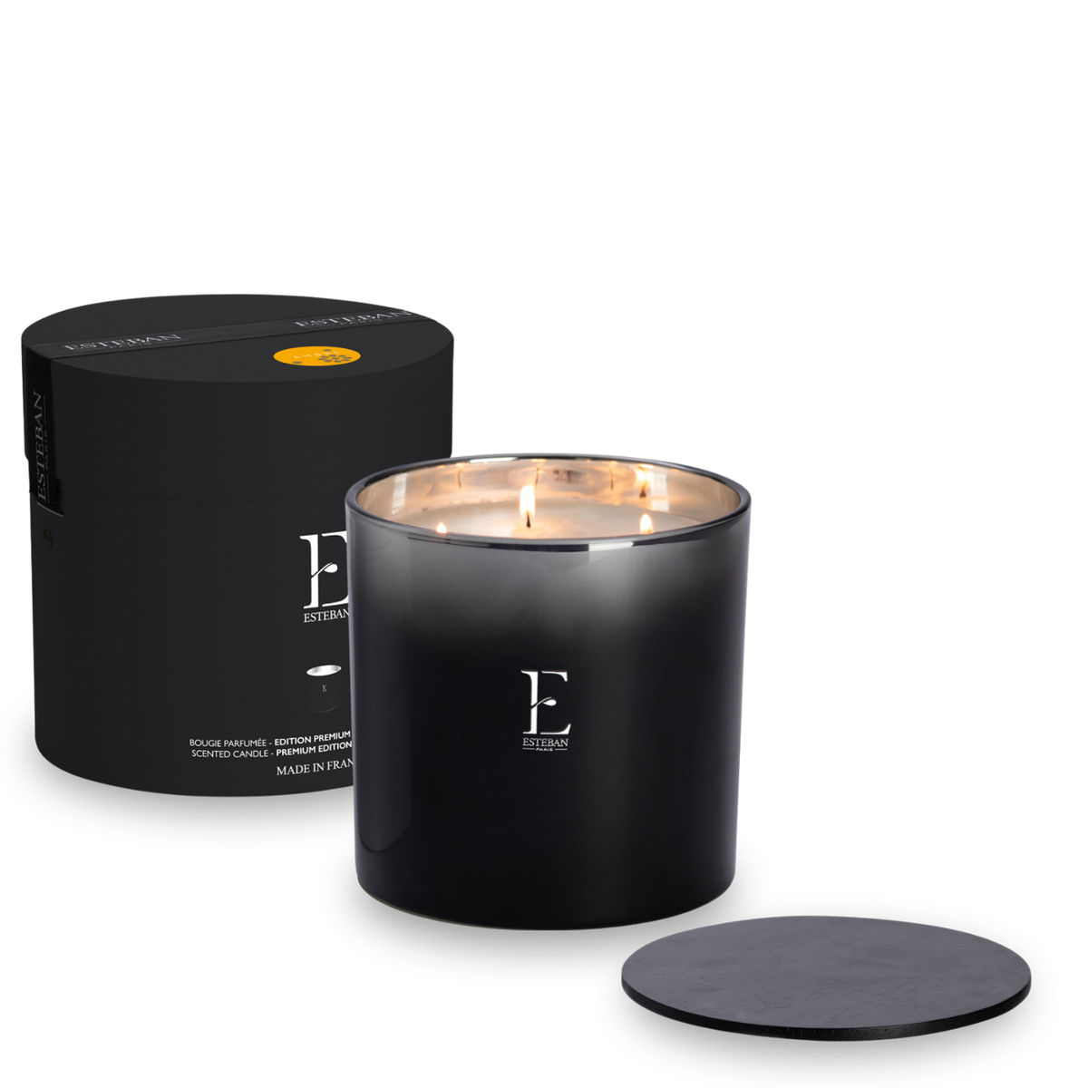 Bougie parfumée Esteban Paris Édition Premium, bougie parfumée grand format en verre noir avec trois mèches, présentée avec son coffret cylindrique noir et son couvercle assorti